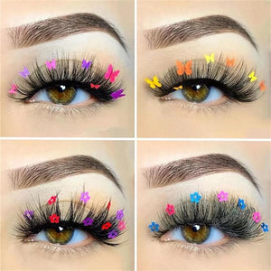Decorative eyelashes enhanced with small fluorescent glitter flakes