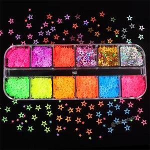 Top view of 12-compartment fluorescent glitter box showing stars, hearts, butterflies and alphabet flakes